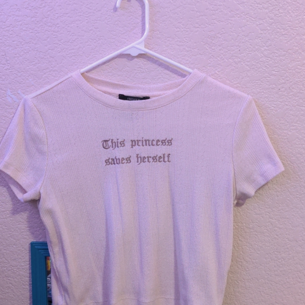 knit-style "this princess saves herself" top